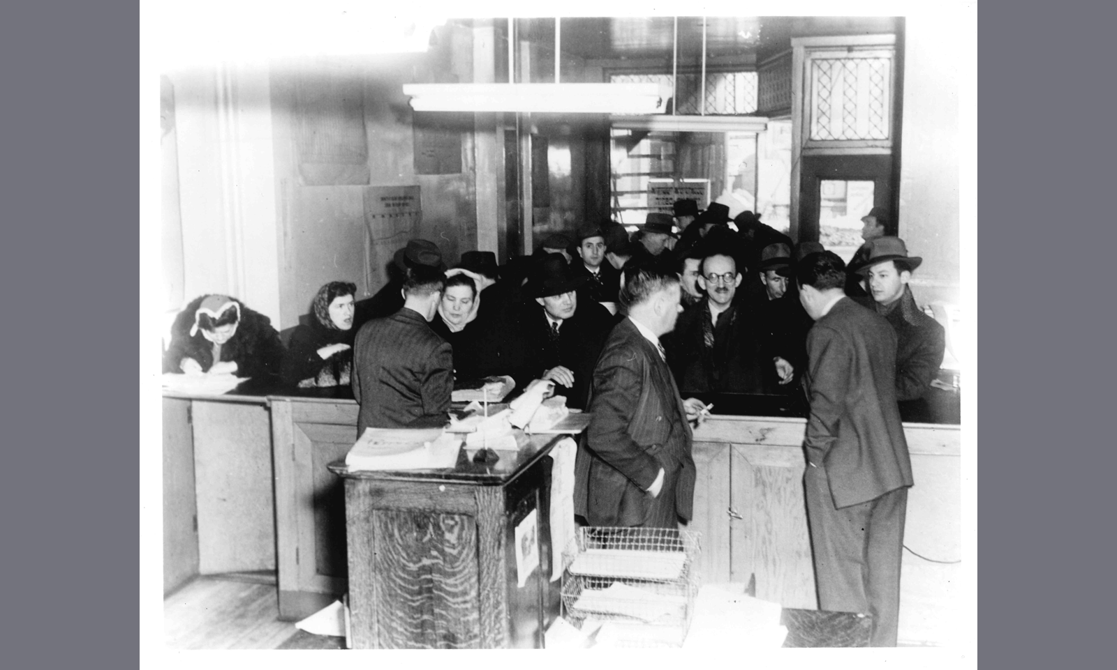 Applicants and staff at the Jewish Immigrant Aid Service office in Montreal