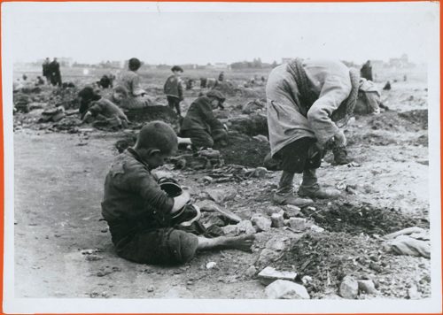 Children searching for and gathering coal