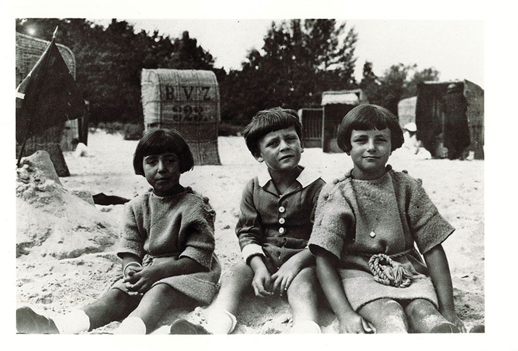 Three children on the beach