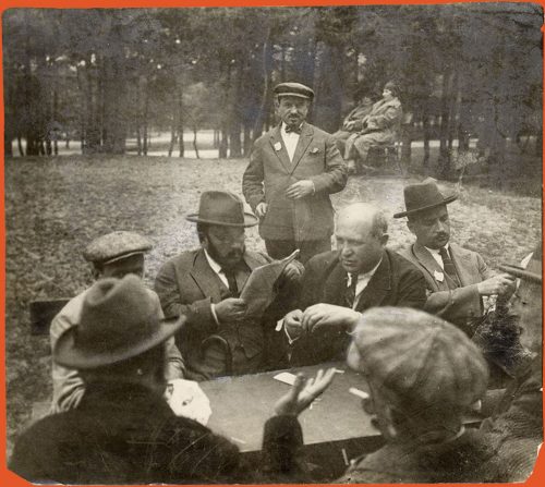 A group playing cards on vacation