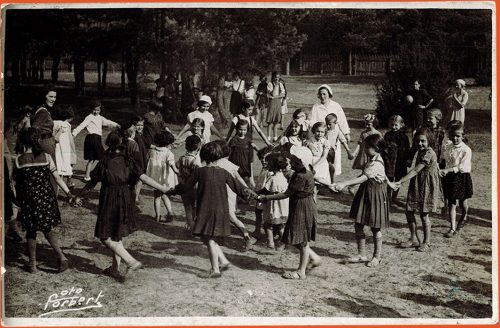 Girls dancing together in a circle