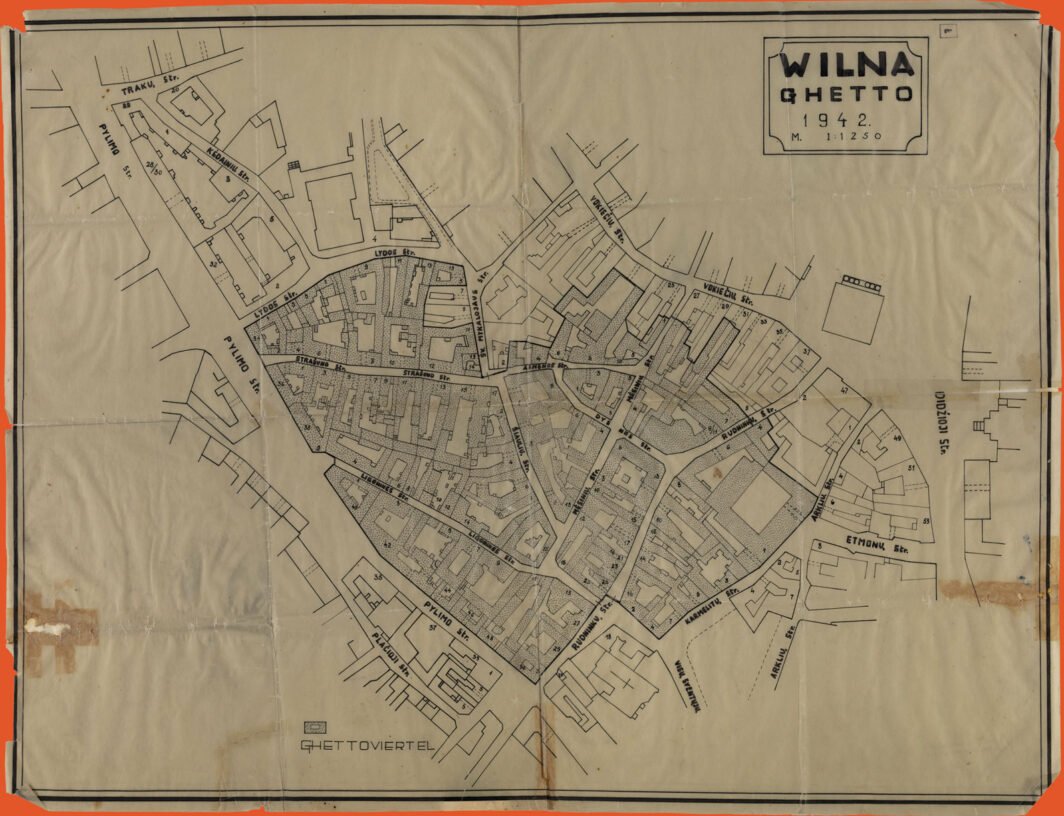 Black ink drawing on tracing paper of city blocks with the area of the Vilna Ghetto marked by a dotted texture. Streets are named in Lithuanian.