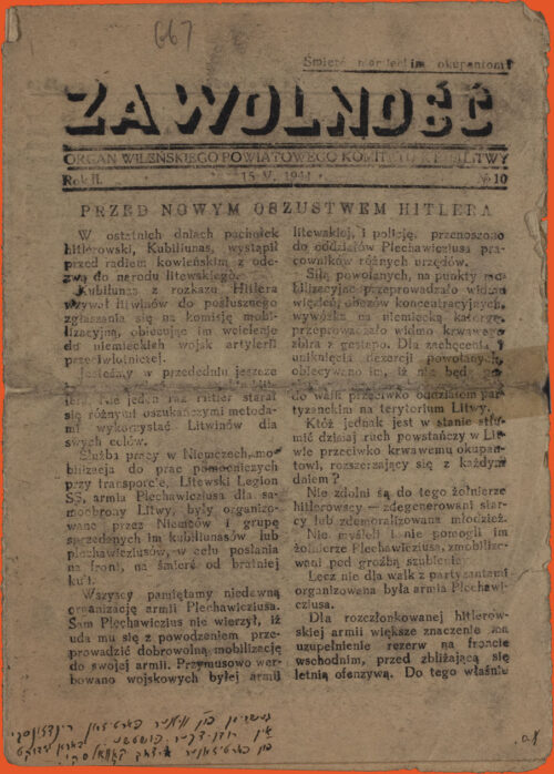 Newspaper cover. Black ink on white paper, in Polish. Title is across the page, with text in two columns below. Handwritten note in Yiddish on the lower left side.