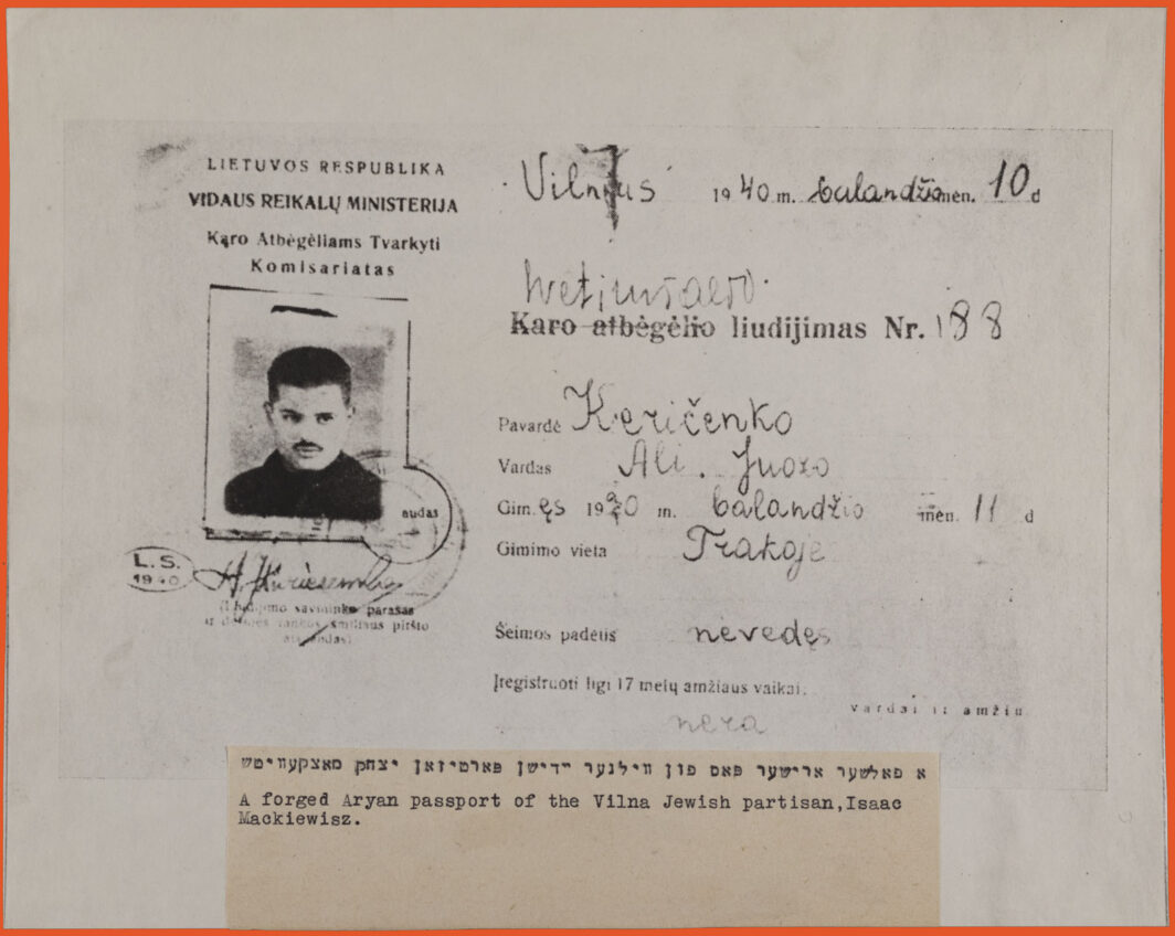 Black and white copy of a passport. Printed document filled by hand. Lithuanian. Features a headshot of a man on the left side.